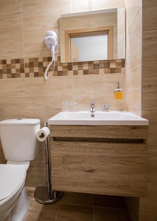 Koupelna v ubytování Rókabérc Vadászház Hotel