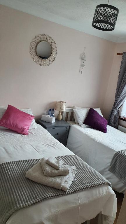 Postel nebo postele na pokoji v ubytování Tranquility