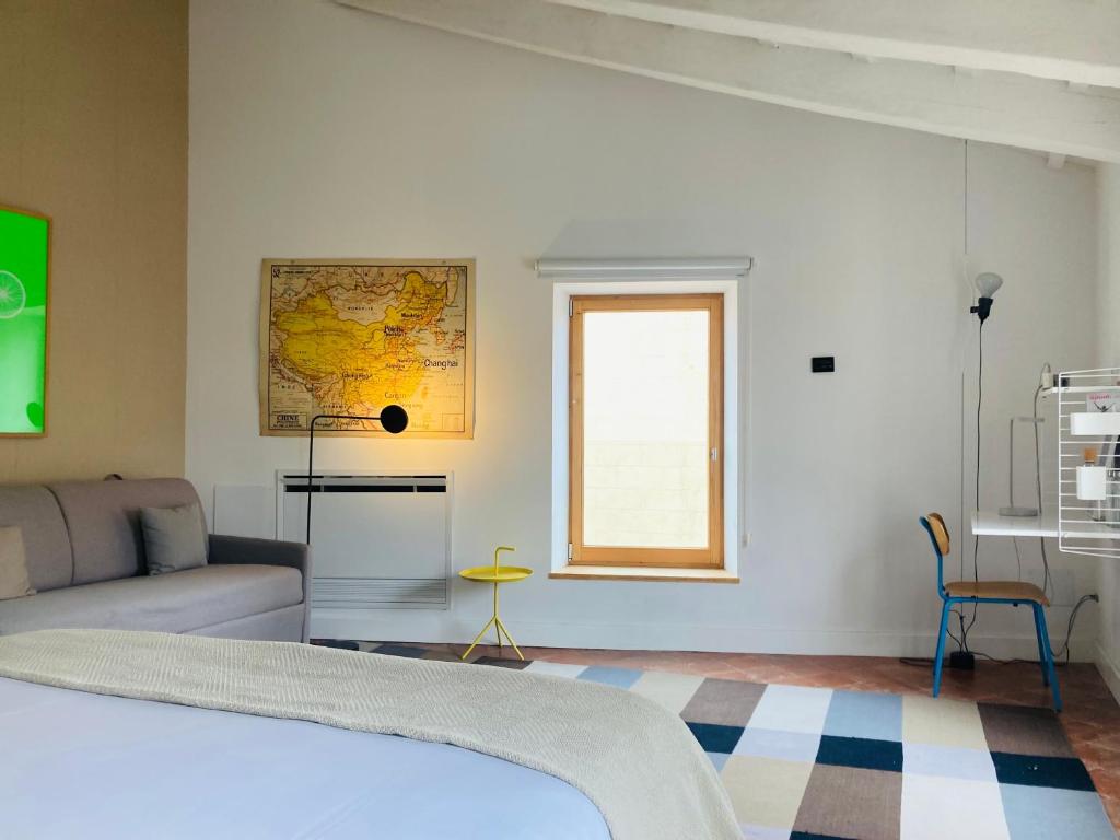 Postel nebo postele na pokoji v ubytování Hotel Hevresac Singular & Small