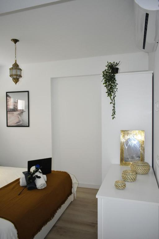 Posteľ alebo postele v izbe v ubytovaní PARIS DREAM - Torremolinos