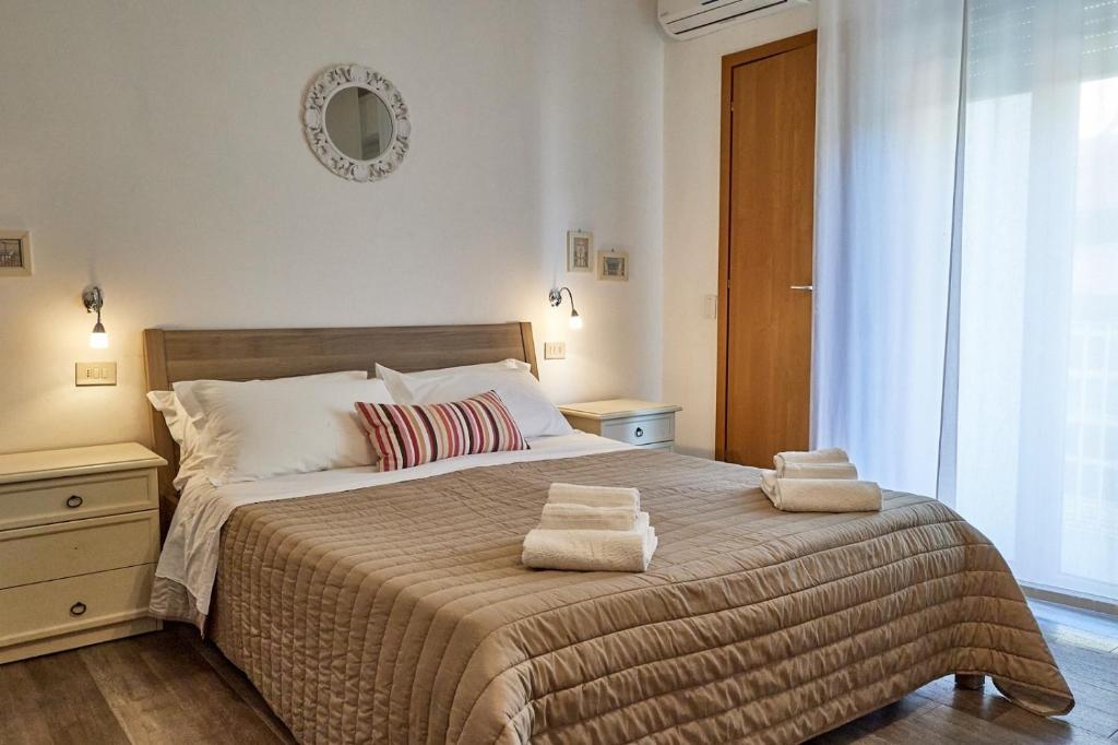Postel nebo postele na pokoji v ubytování Hotel Spring