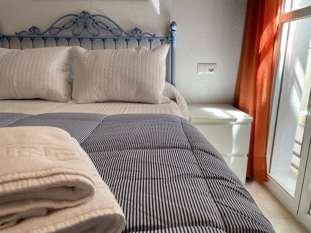Posteľ alebo postele v izbe v ubytovaní Apartamento Duplex El Tinte