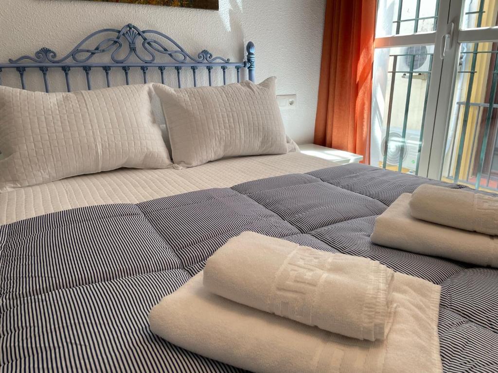 Posteľ alebo postele v izbe v ubytovaní Apartamento Duplex El Tinte