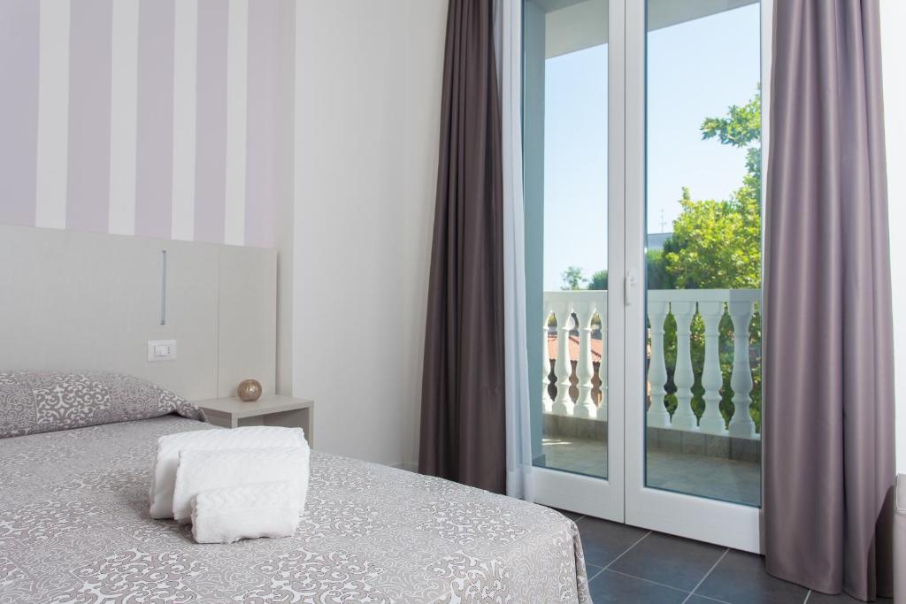 Postel nebo postele na pokoji v ubytování Hotel Star