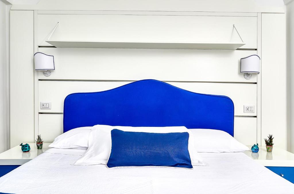 Postel nebo postele na pokoji v ubytování Le Botteghe 59 Capri
