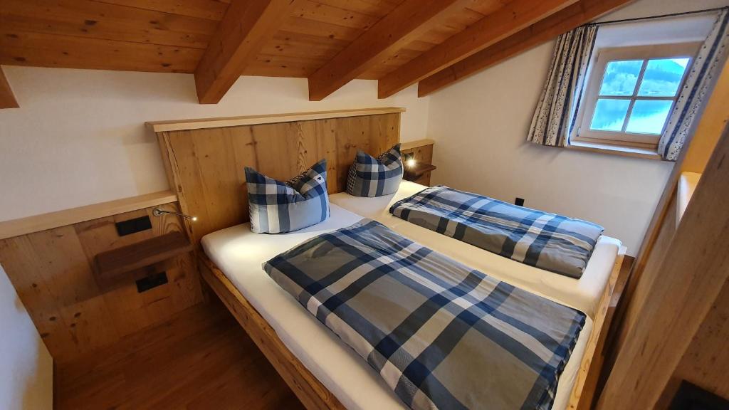 Postel nebo postele na pokoji v ubytování Der Anderlbauer am See