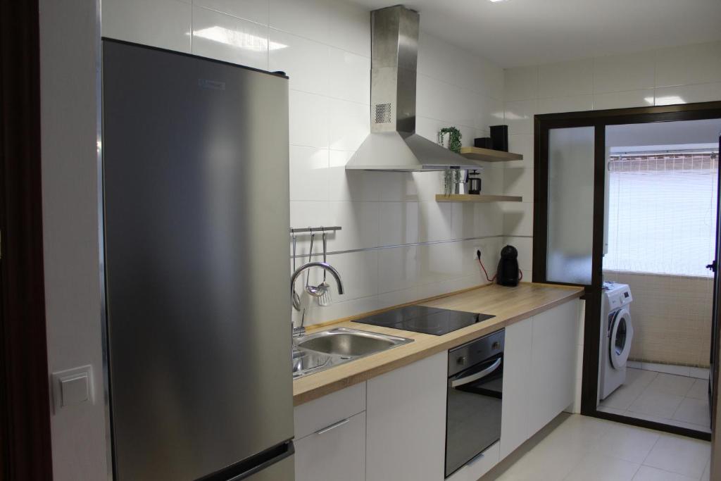 Kuchyň nebo kuchyňský kout v ubytování Ludyco Homes Las Murallas