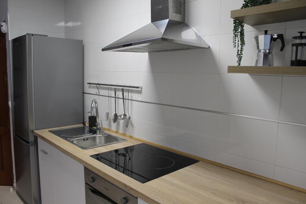 Kuchyň nebo kuchyňský kout v ubytování Ludyco Homes Las Murallas