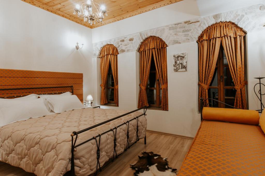 Uma cama ou camas num quarto em Hotel SS KEKEZI