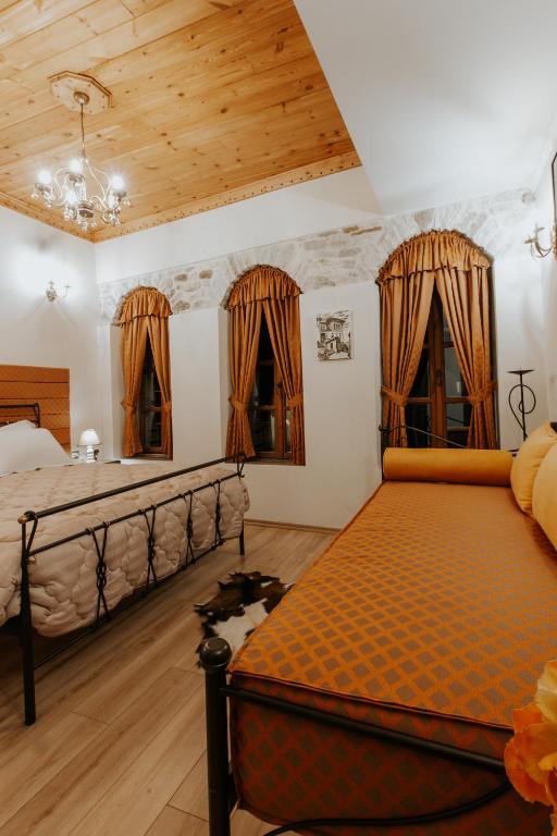 Uma cama ou camas num quarto em Hotel SS KEKEZI