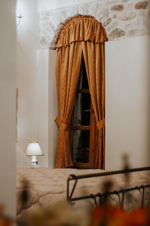 Uma cama ou camas num quarto em Hotel SS KEKEZI