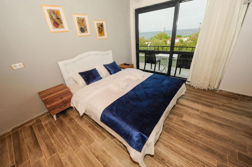 Postel nebo postele na pokoji v ubytování Assos No9 Hotel