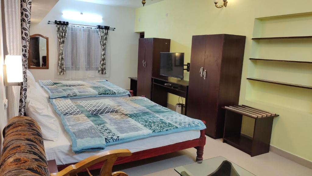 Postel nebo postele na pokoji v ubytování Royal Serene Villas