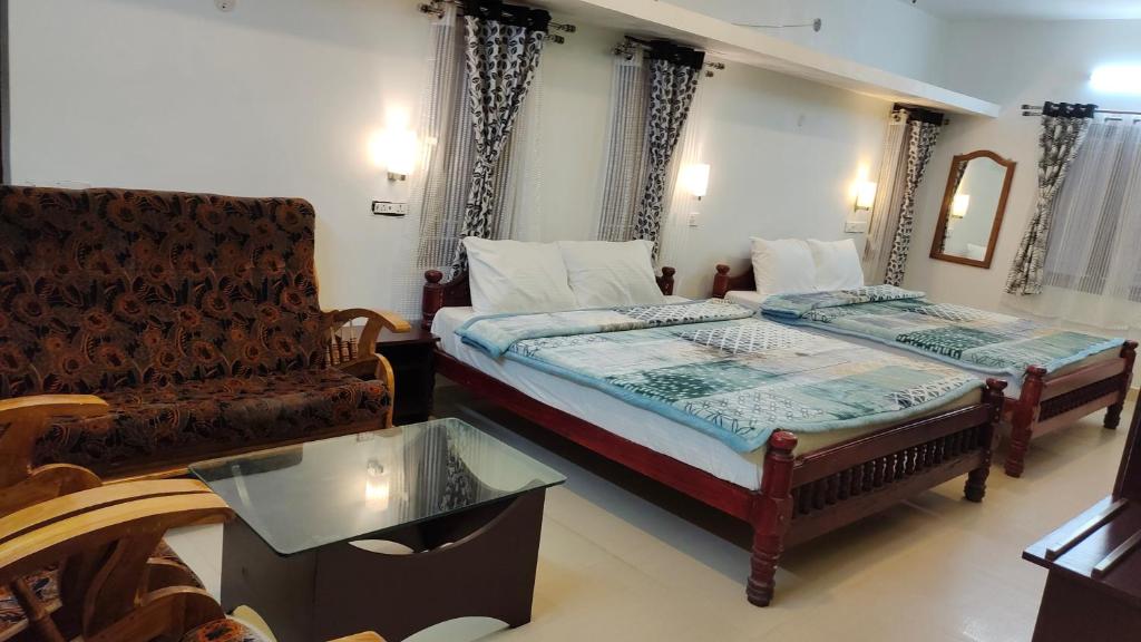 Postel nebo postele na pokoji v ubytování Royal Serene Villas