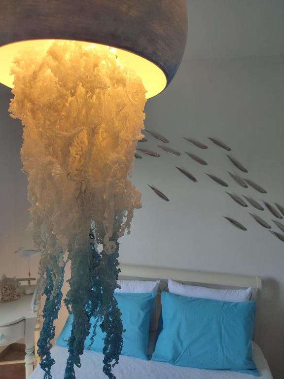 Postel nebo postele na pokoji v ubytování Sea Art House