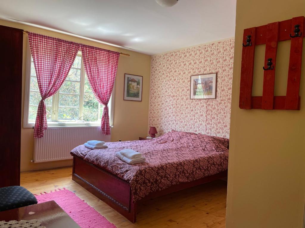 Postel nebo postele na pokoji v ubytování Ethno Village Slatkovac