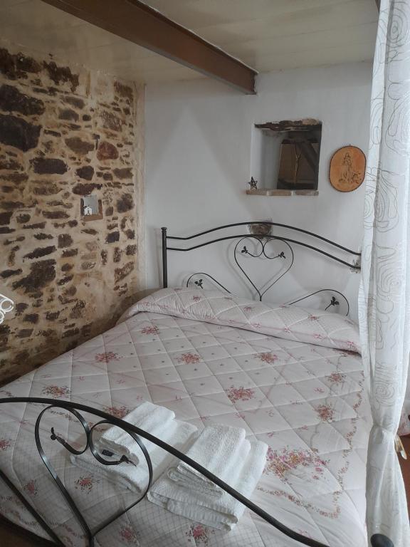 Postel nebo postele na pokoji v ubytování La lammia di Pisticci