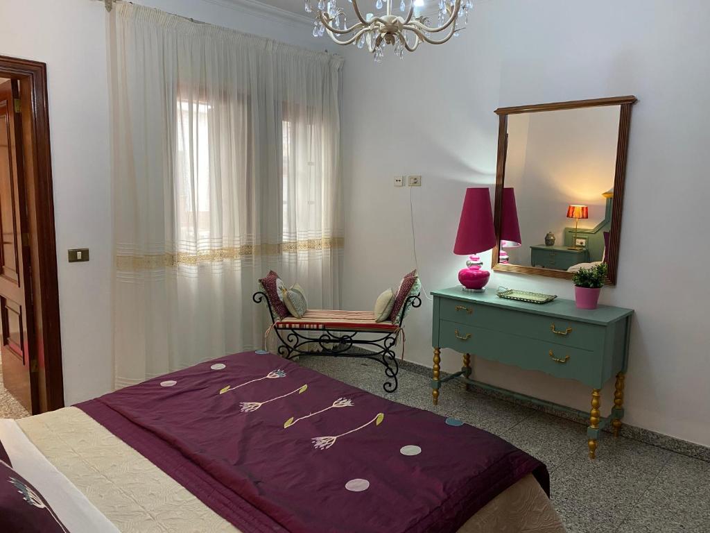 Posteľ alebo postele v izbe v ubytovaní Casa Charry