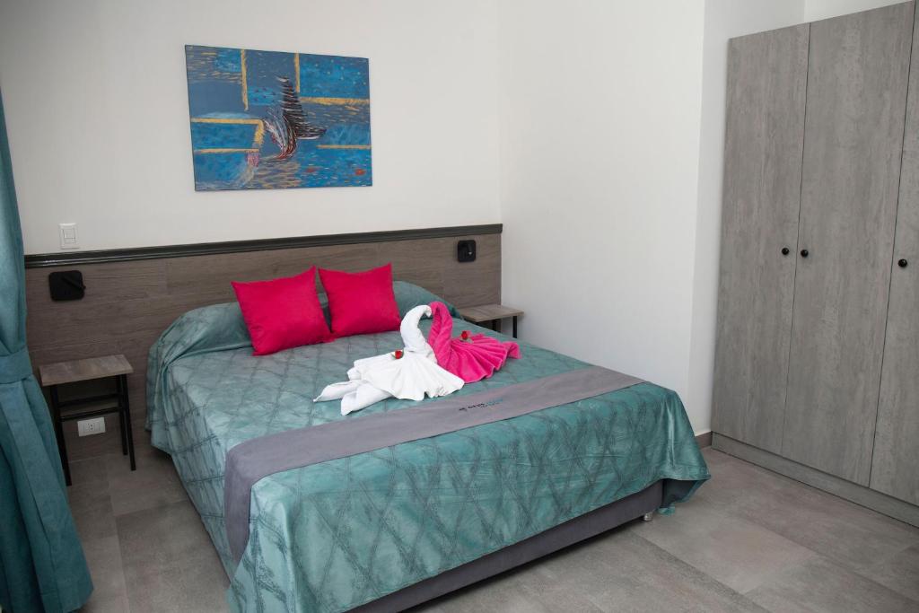 Postel nebo postele na pokoji v ubytování Hotel Oasis-Dream Holidays - La Petite France