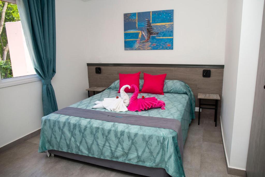 Postel nebo postele na pokoji v ubytování Hotel Oasis-Dream Holidays - La Petite France