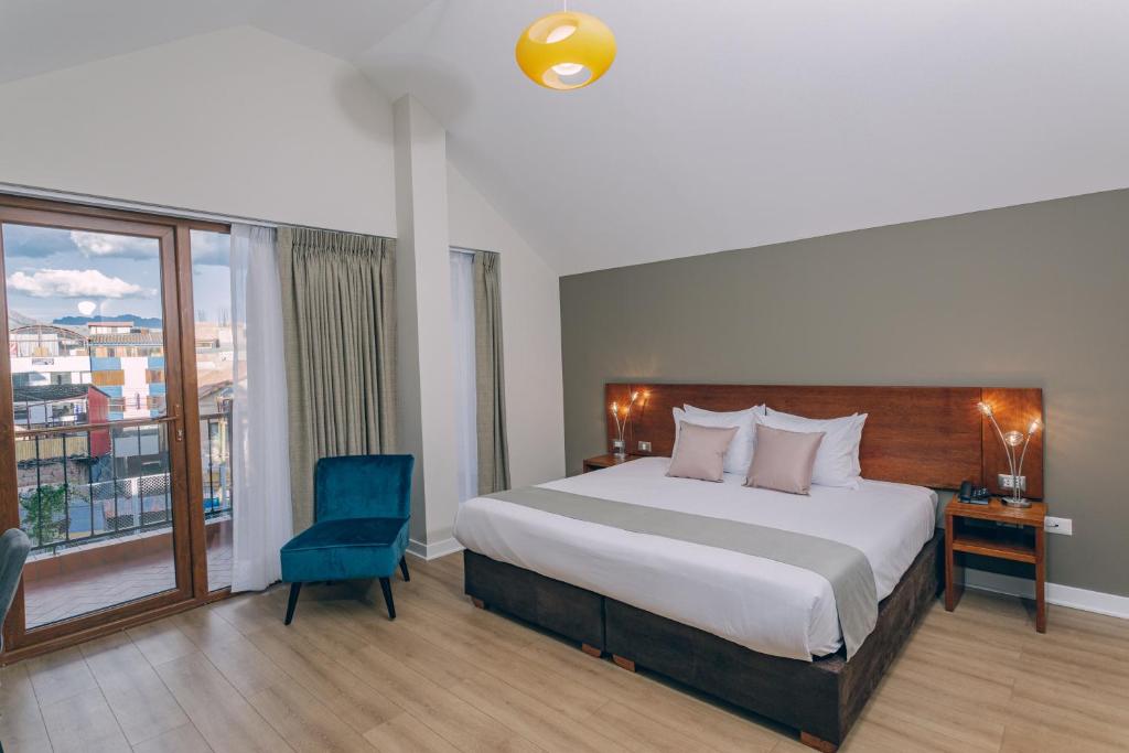 Saska Boutique Hotel客房内的一张或多张床位