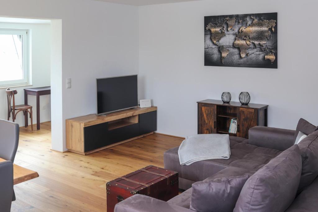 TV a/nebo společenská místnost v ubytování Ferienwohnung Melcher