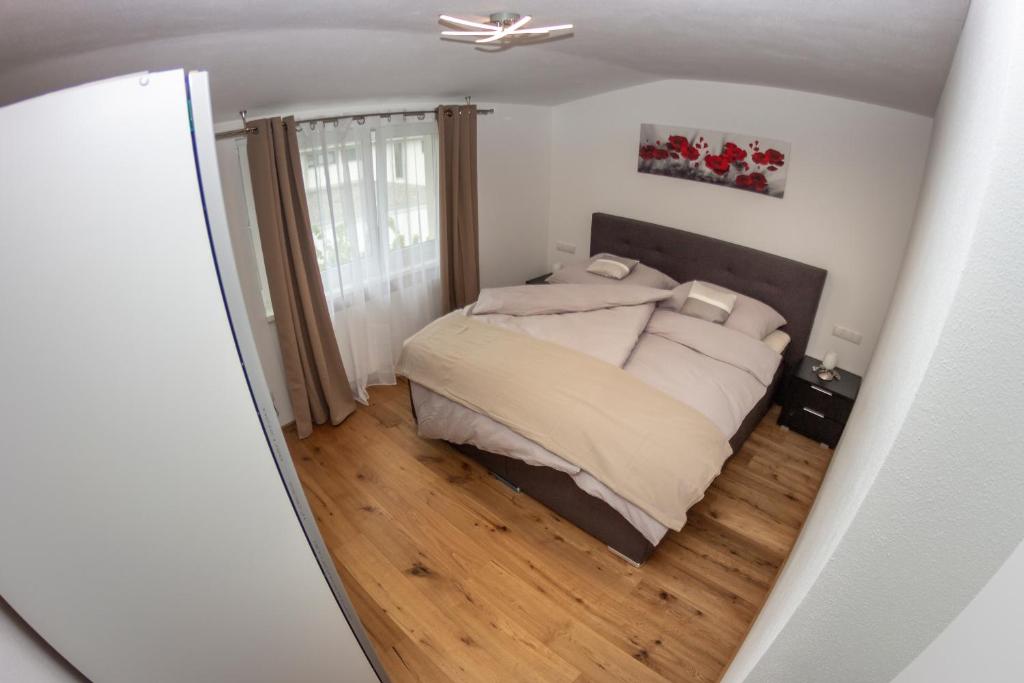 Postel nebo postele na pokoji v ubytování Ferienwohnung Melcher