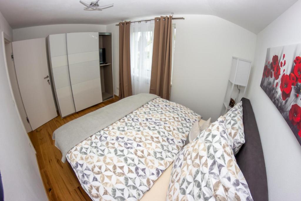 Postel nebo postele na pokoji v ubytování Ferienwohnung Melcher