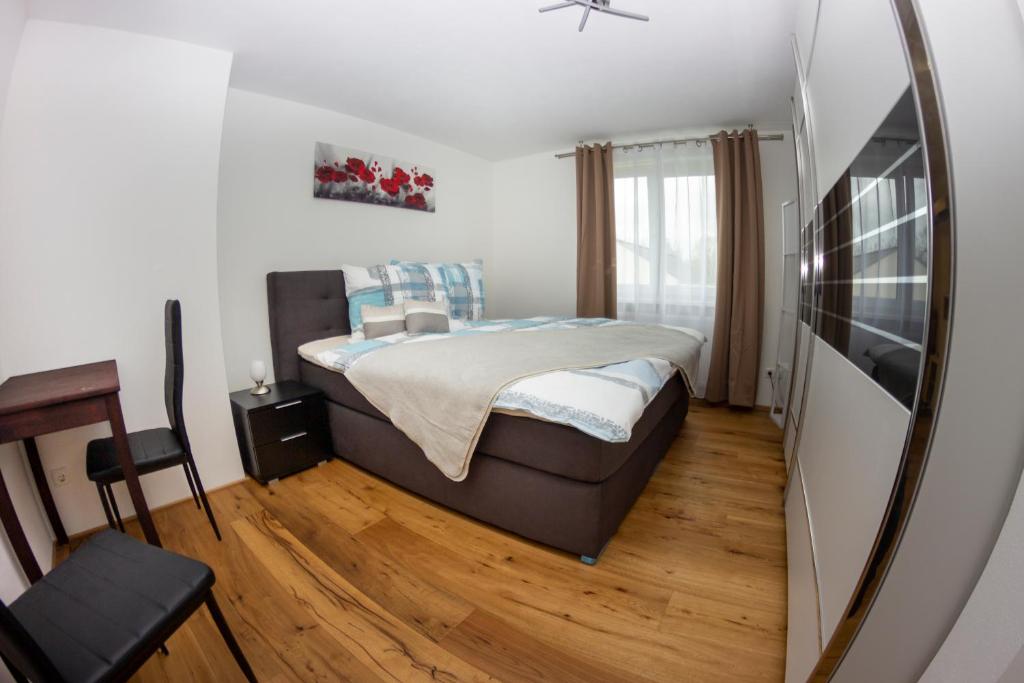Postel nebo postele na pokoji v ubytování Ferienwohnung Melcher