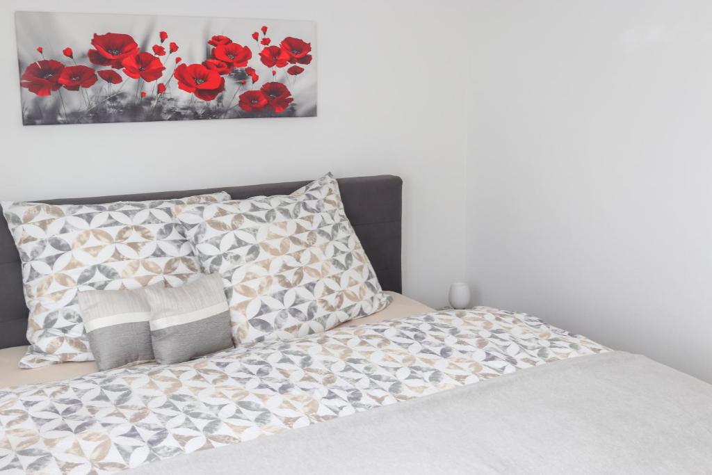 Postel nebo postele na pokoji v ubytování Ferienwohnung Melcher