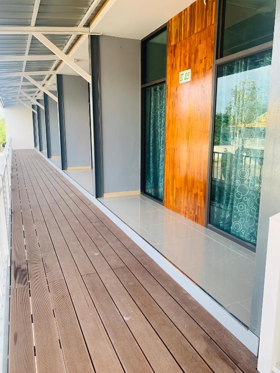 Balkón nebo terasa v ubytování บ้านพิชชา ที่พักใจกลางเมืองปราณบุรี