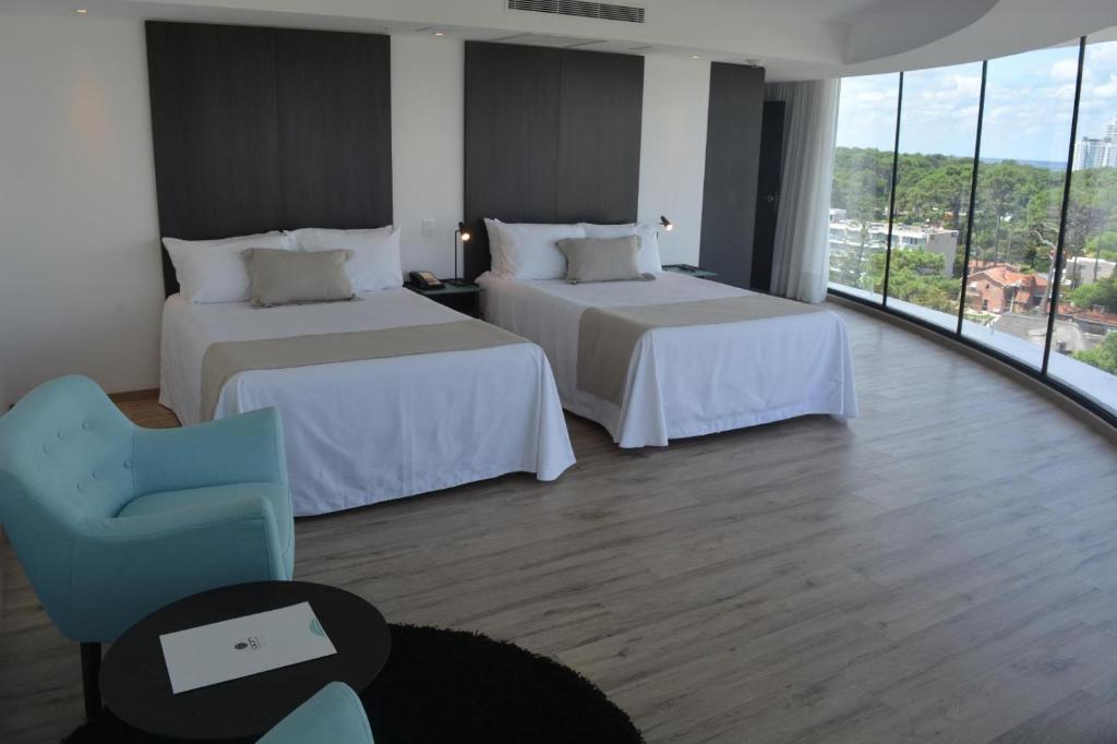 Postel nebo postele na pokoji v ubytování Don Hotel