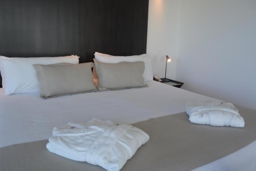 Postel nebo postele na pokoji v ubytování Don Hotel