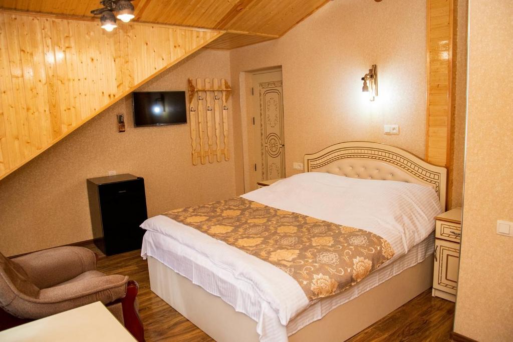 Postel nebo postele na pokoji v ubytování Har-Mar Hotel