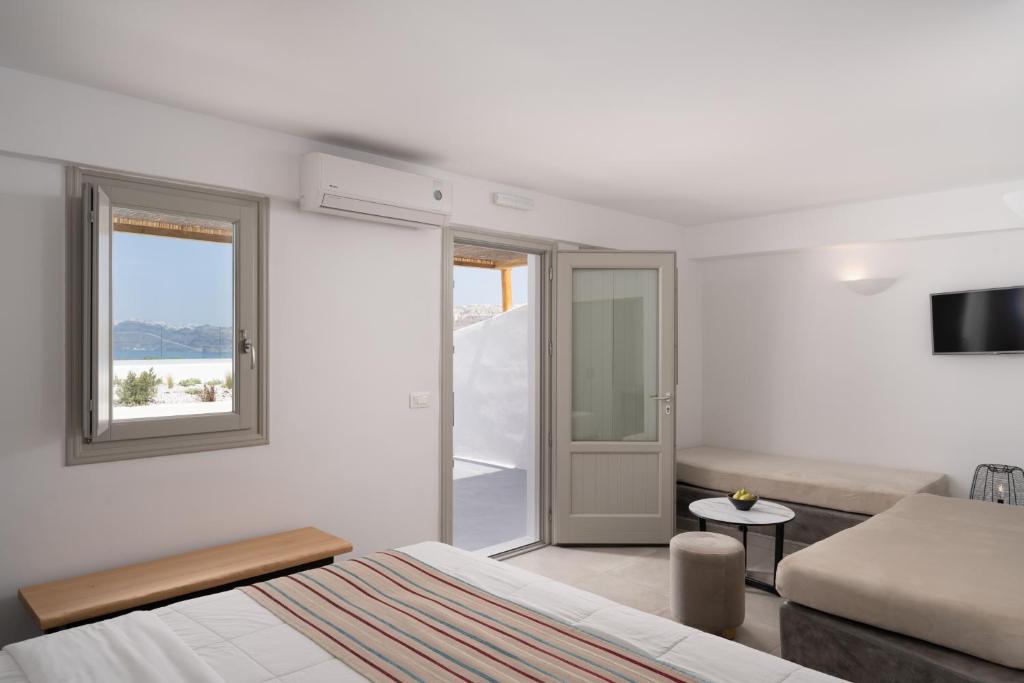 Letto o letti in una camera di Hotel Goulielmos