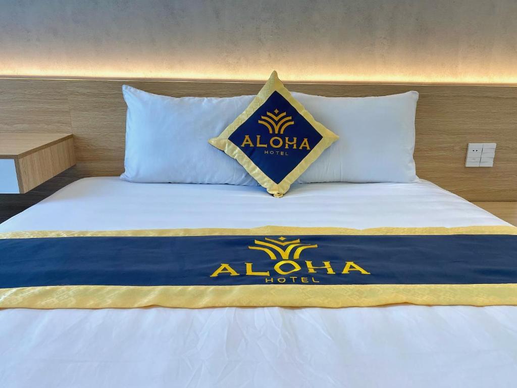 Postel nebo postele na pokoji v ubytování Aloha Hotel Vung Tau