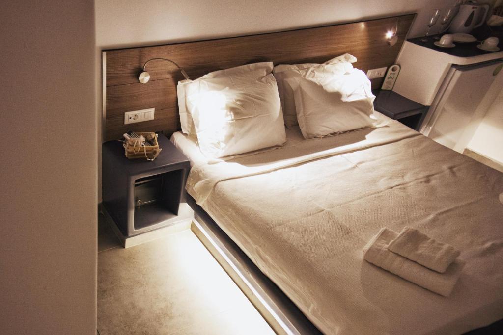 Letto o letti in una camera di Villa Galaxy Santorini