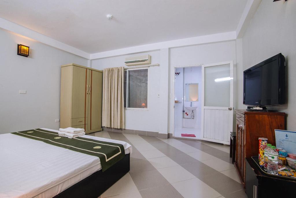 TV a/nebo společenská místnost v ubytování Joye Hotel