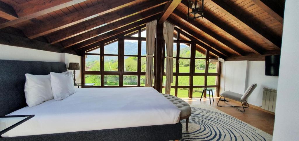 Postel nebo postele na pokoji v ubytování Refugio del Cares