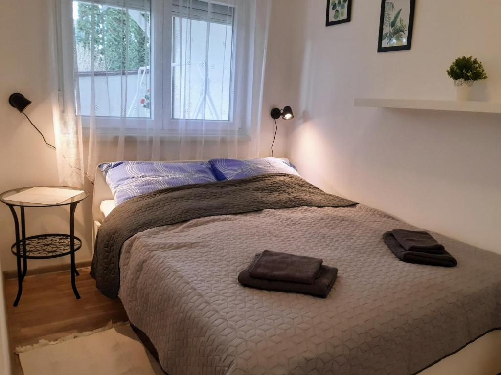 Łóżko lub łóżka w pokoju w obiekcie Holiday Home Balatonszárszó