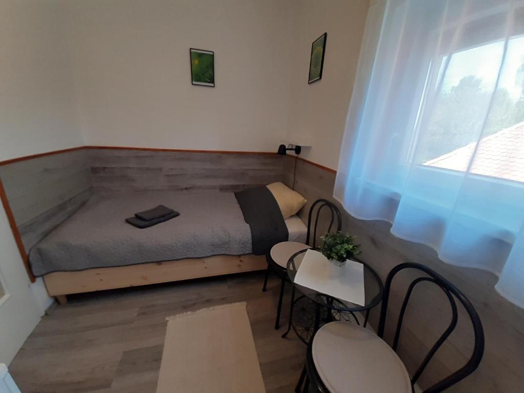 Łóżko lub łóżka w pokoju w obiekcie Holiday Home Balatonszárszó