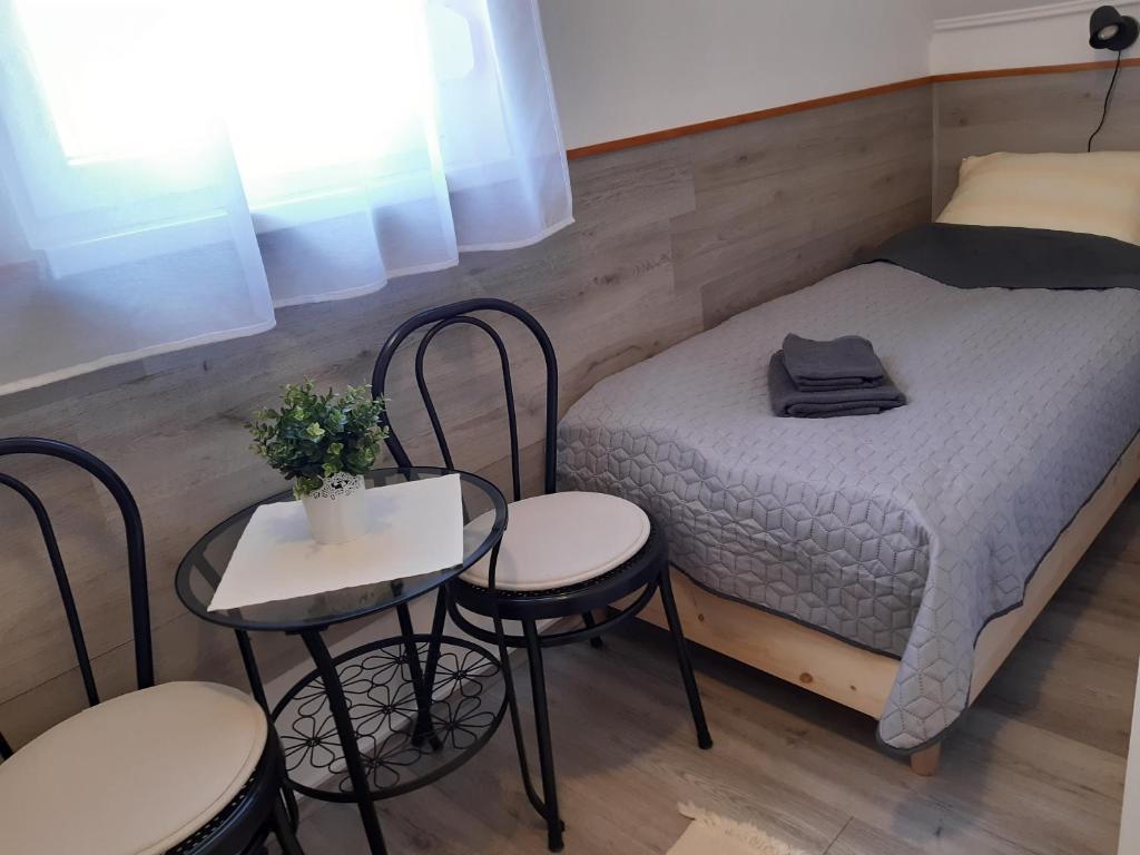 Łóżko lub łóżka w pokoju w obiekcie Holiday Home Balatonszárszó