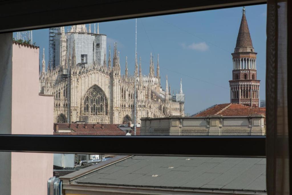 a view of a cathedral from a window at Enjoy Garden - Flavio Baracchini 9 in Milan