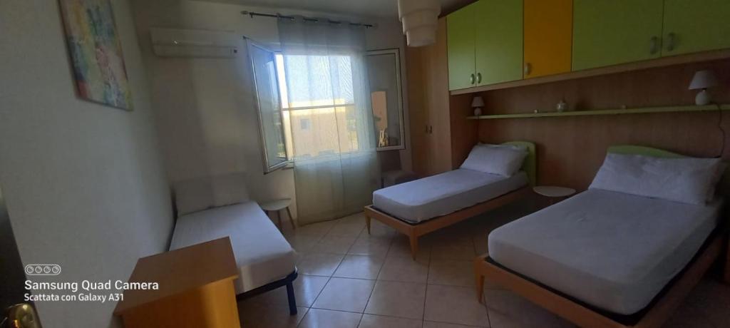 Łóżko lub łóżka w pokoju w obiekcie Villa Cabirol