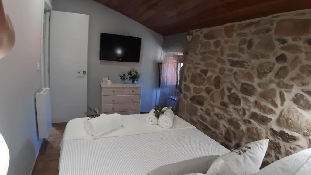 Cama o camas de una habitación en A Casiña Vella