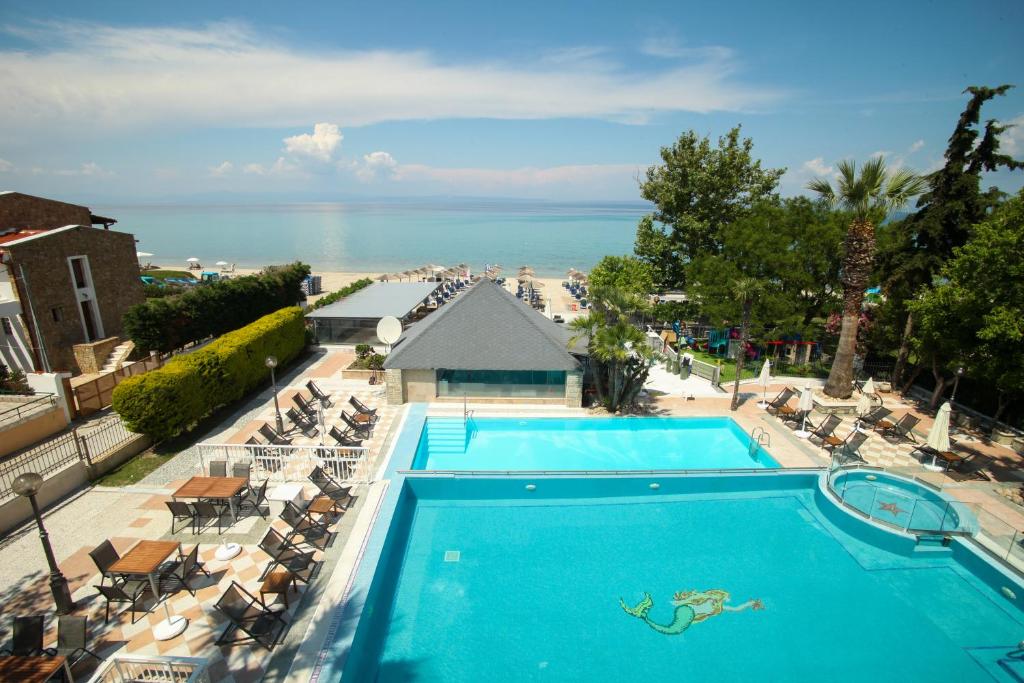 an overhead view of a swimming pool at a resort at Naias in Hanioti