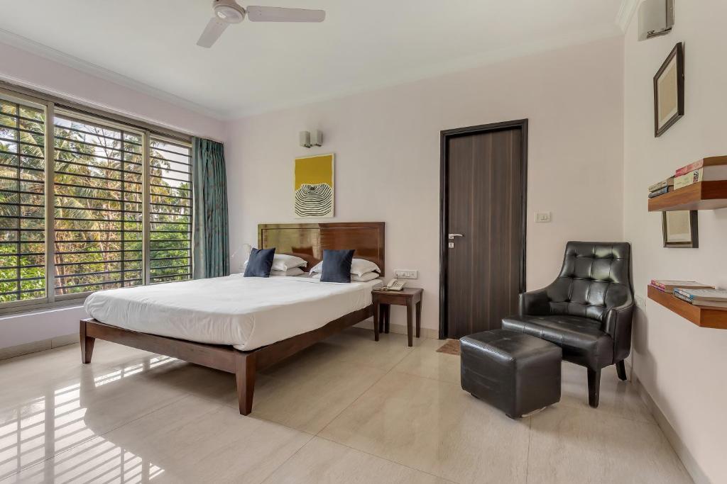 Postel nebo postele na pokoji v ubytování Arotel Rooms & Suites Calangute