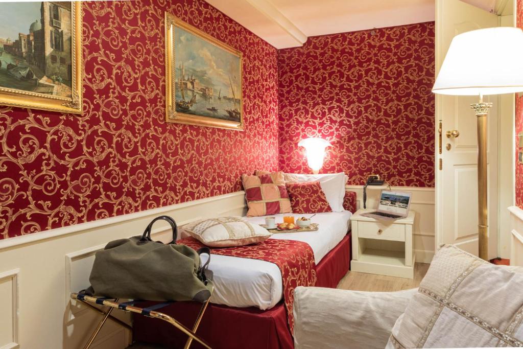 Łóżko lub łóżka w pokoju w obiekcie Duodo Palace