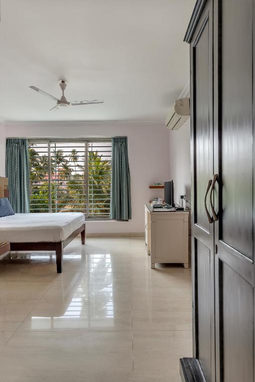 Postel nebo postele na pokoji v ubytování Arotel Rooms & Suites Calangute
