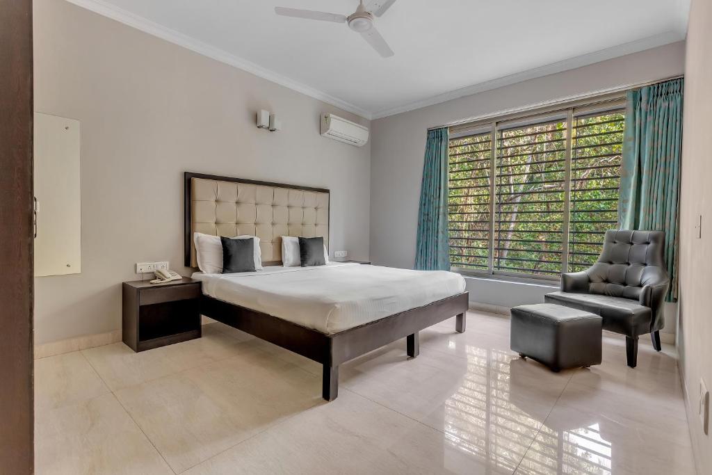 Postel nebo postele na pokoji v ubytování Arotel Rooms & Suites Calangute